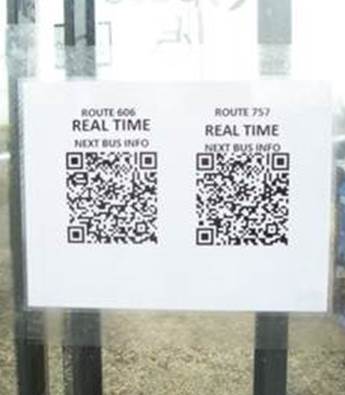 This is an image of a bus tracker QR code posted inside a Pace bus shelter.