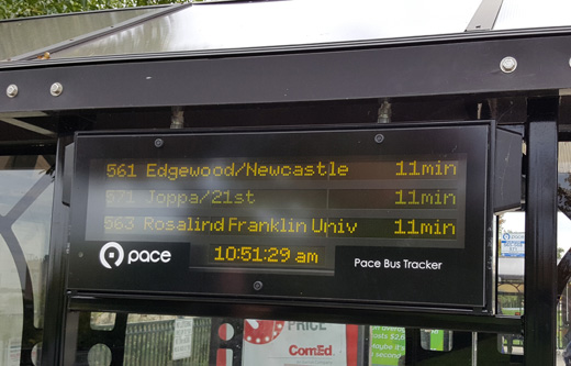 This is a closeup image of a digital bus tracker sign. 