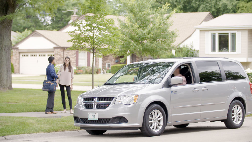 Image of vanpool van with a couple