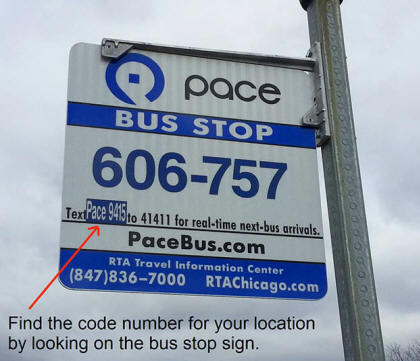 This is an image of a bus stop sign that features a text code to sign up for the bus tracker text messaging service.