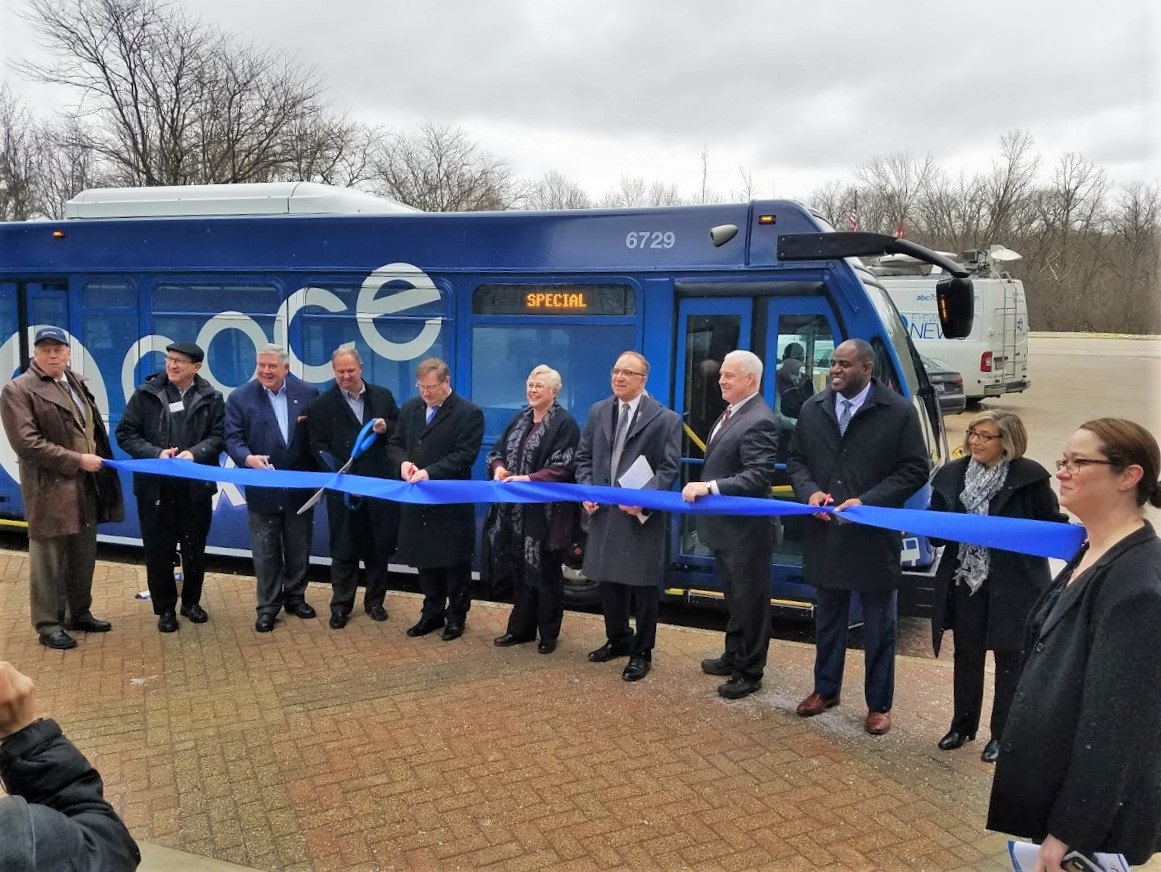 Bus on Shoulder Edens Ribbon Cutting