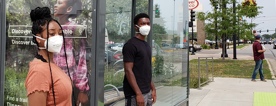 Image of Riders with Masks at Pulse Station