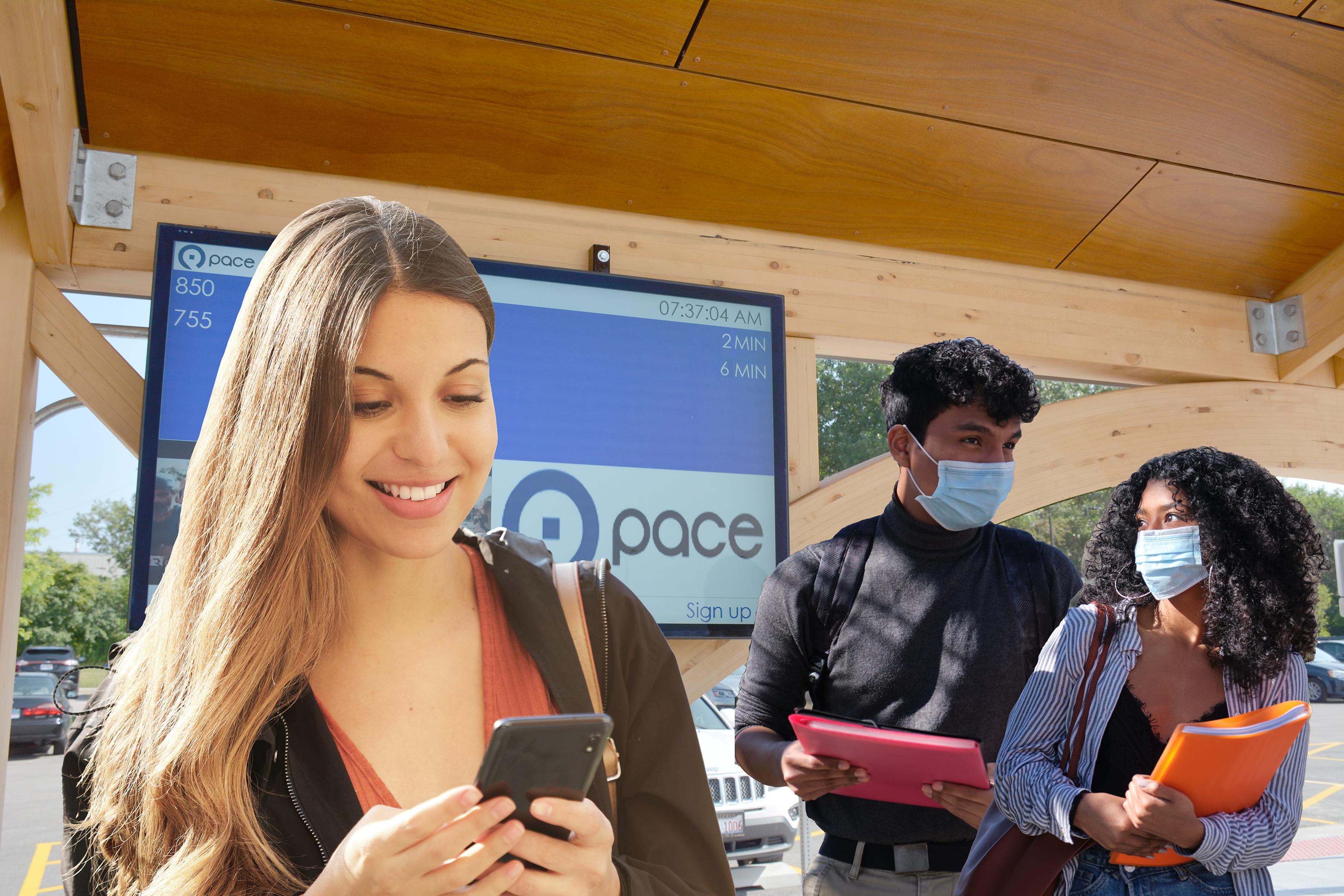 Image of a student waiting at a Pace transit center