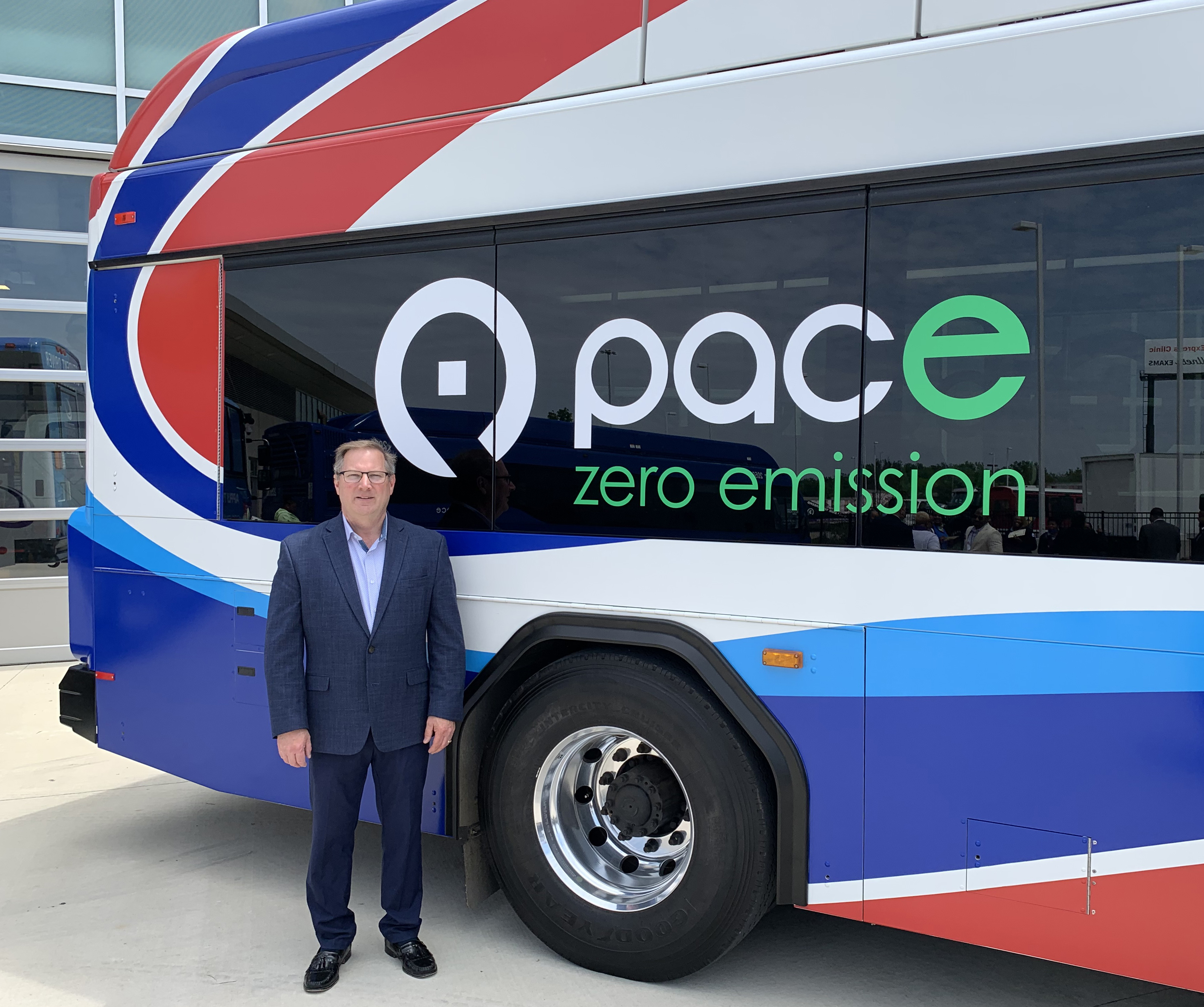 Image of Pace Electric Bus with Chairman Kwasneski