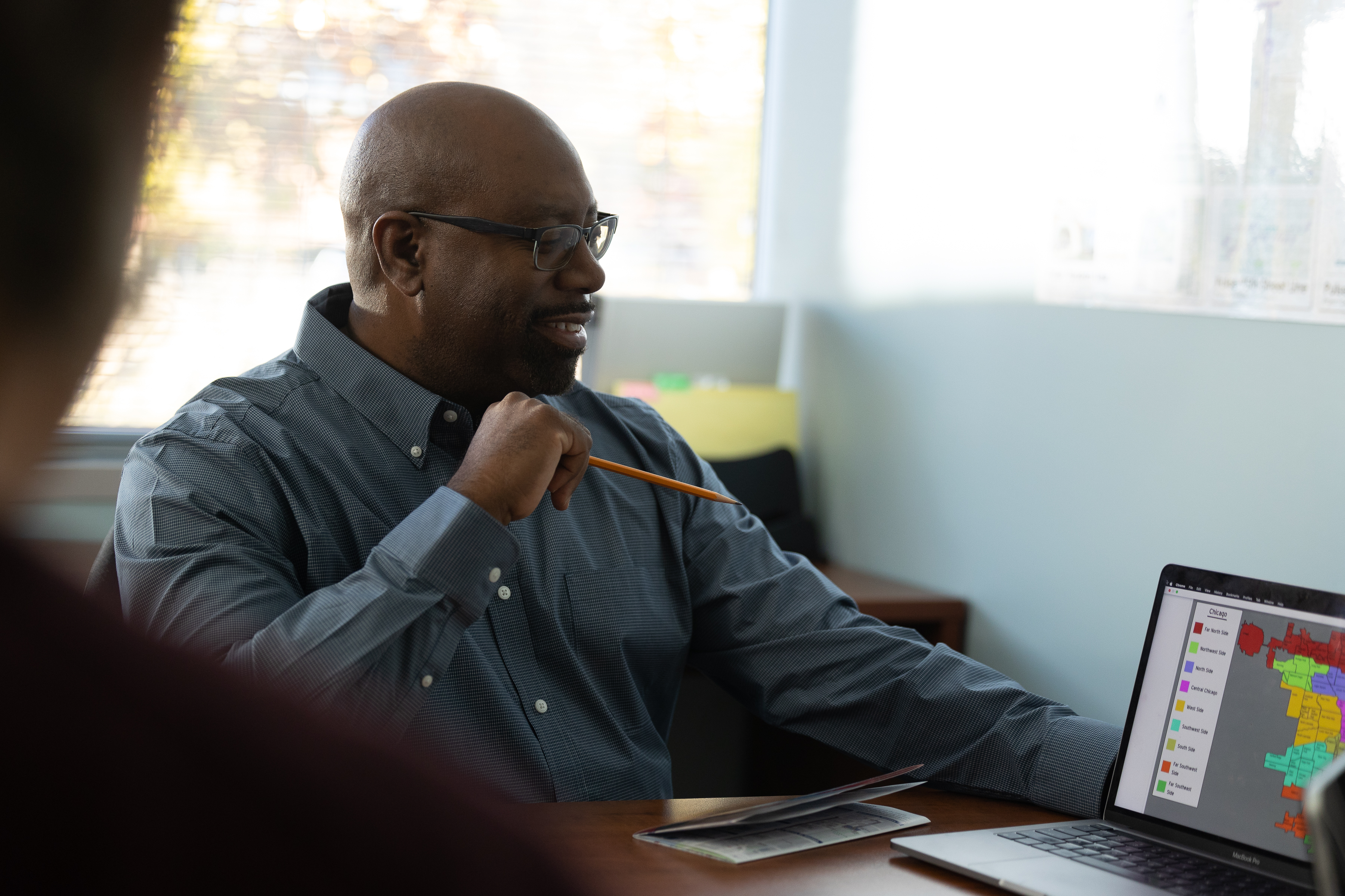 man looking at laptop screen