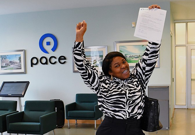 Image of excited job applicant with job offer letter