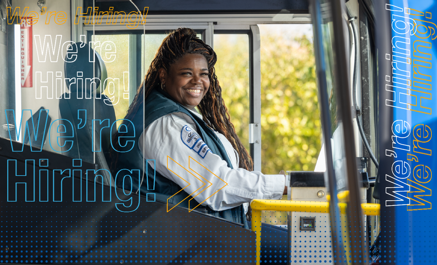 Image of female bus driver with the words we're hiring