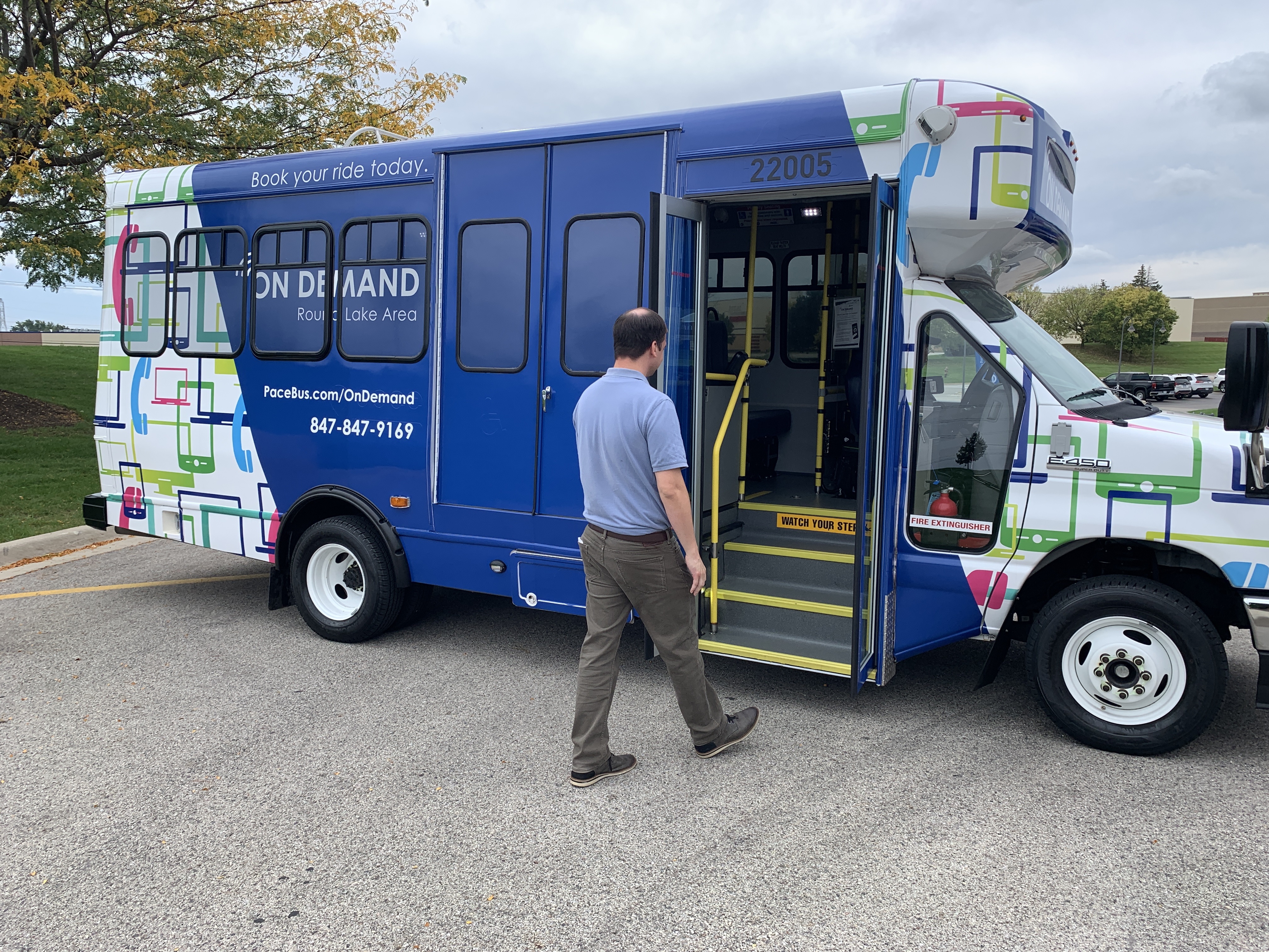 man boarding On Demand bus