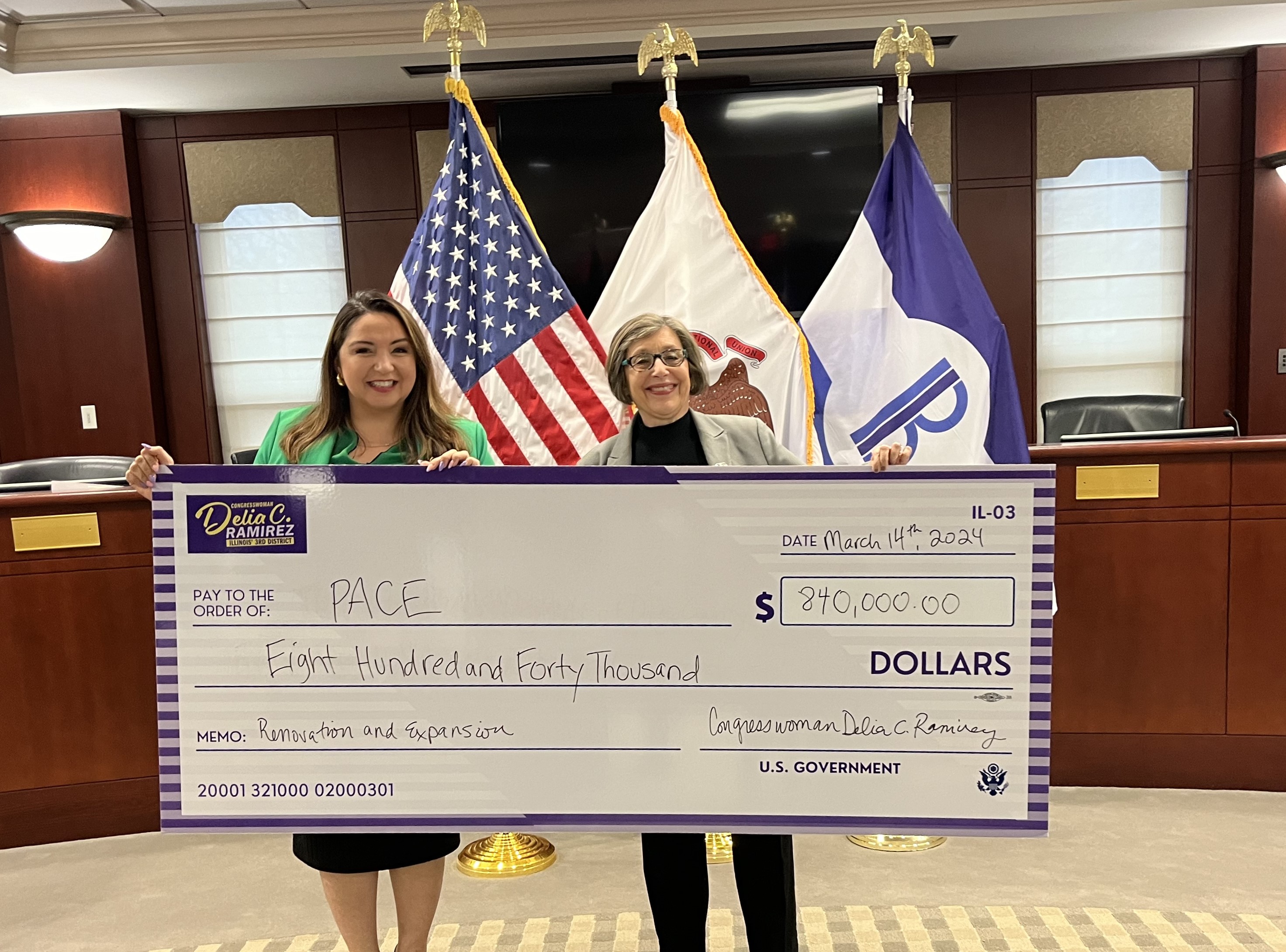 Image of Congresswoman Delia Ramirez & Pace Executive Melinda Metzger with oversized earmark check