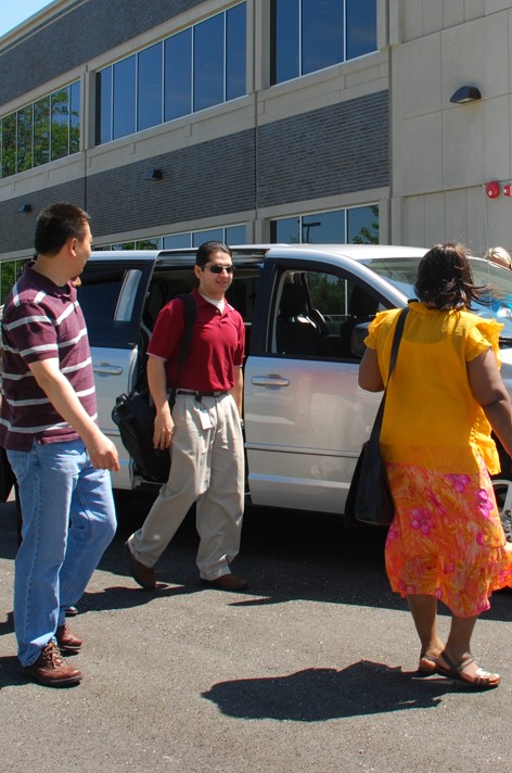 Vanpoolers Drive Together in a Pace Van.