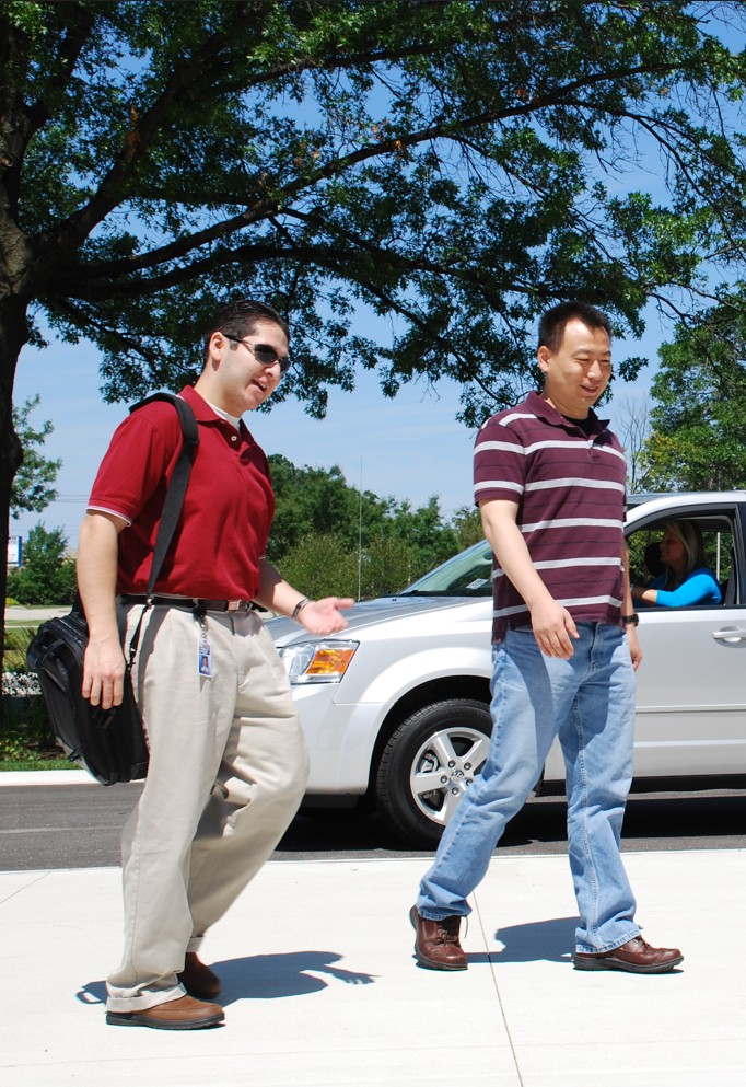 Vanpoolers Drive Together in a Pace Van.