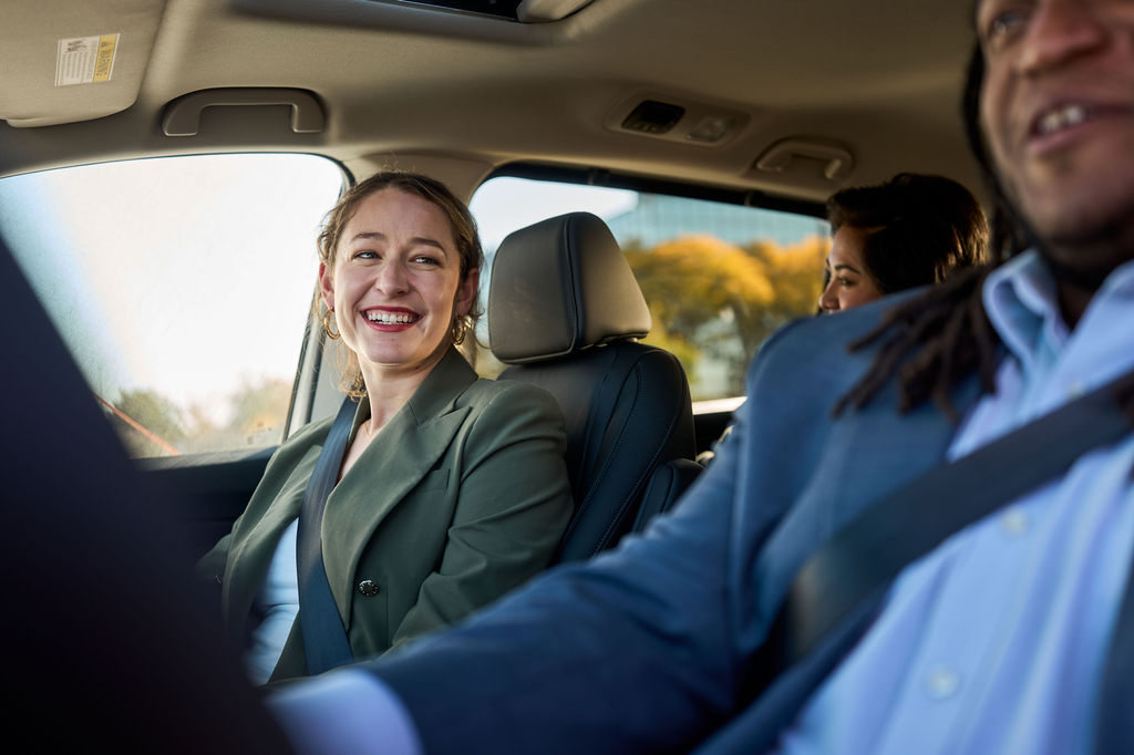 Image of passengers enjoying a vanpool ride.