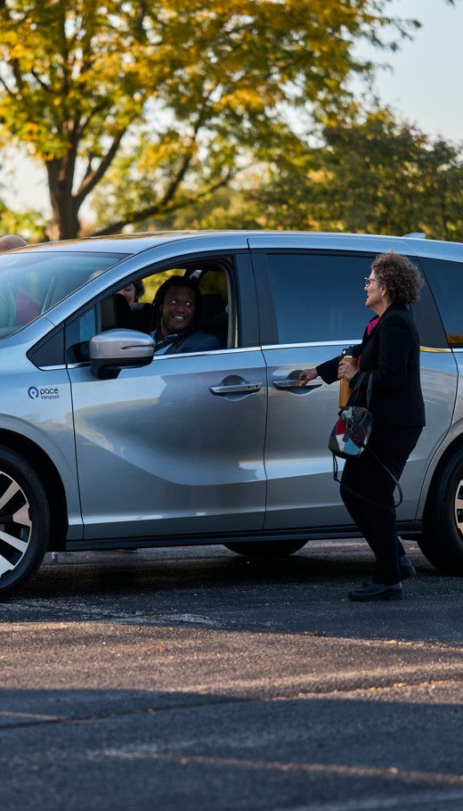 Vanpoolers Drive Together in a Pace Van.