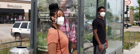 Image of Riders with Masks at Pulse Station