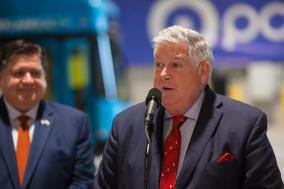 Photo of RTA Chairman Kirk Dillard speaking at podium during an event in Markham