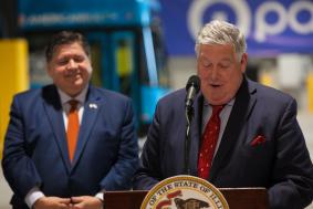 Photo of RTA Chairman Kirk Dillard speaking at podium during an event in Markham