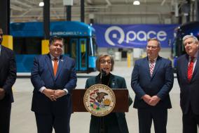 Photo of Pace Executive Director Melinda Metzger speaking at podium during an event in Markham